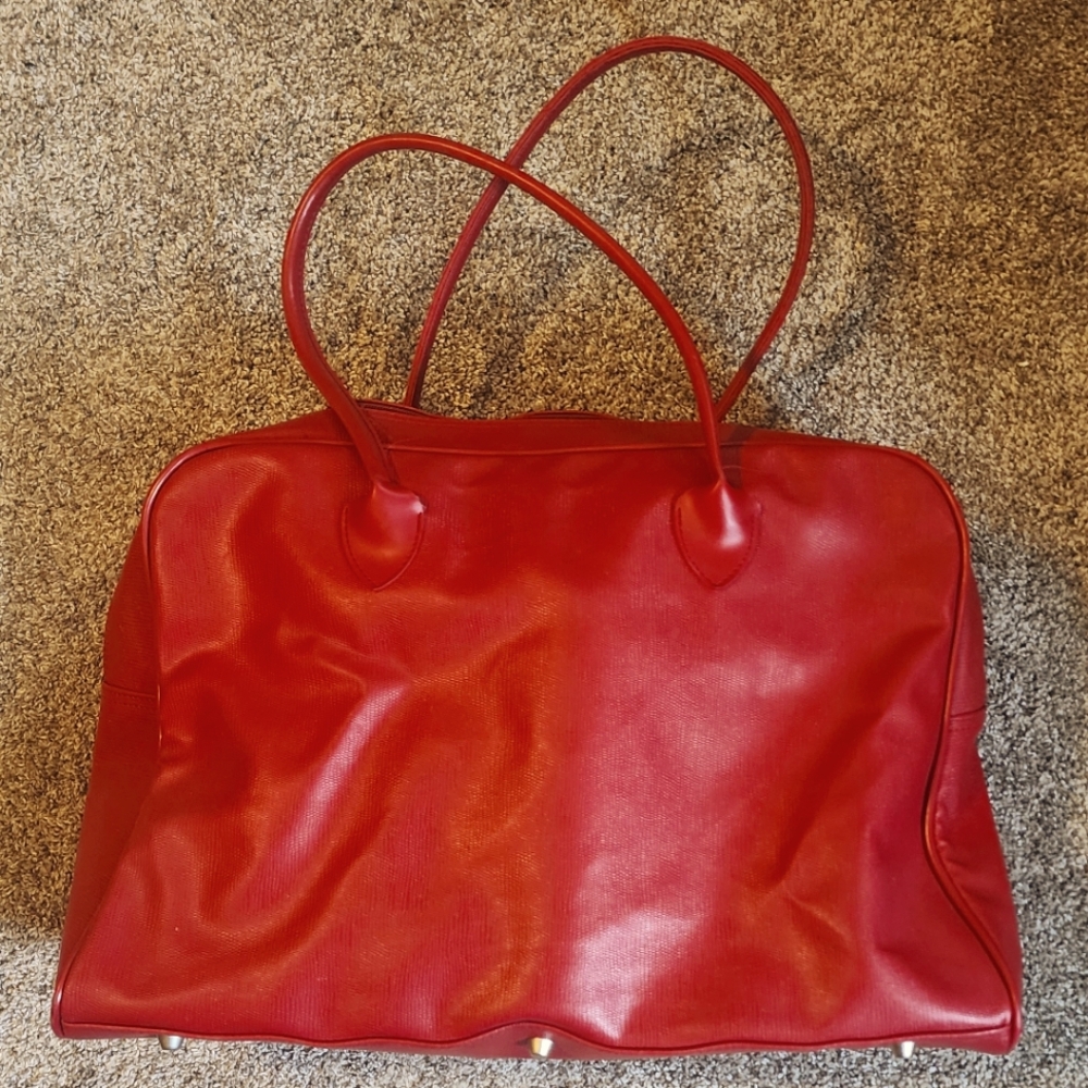 Red luggage tote duffle